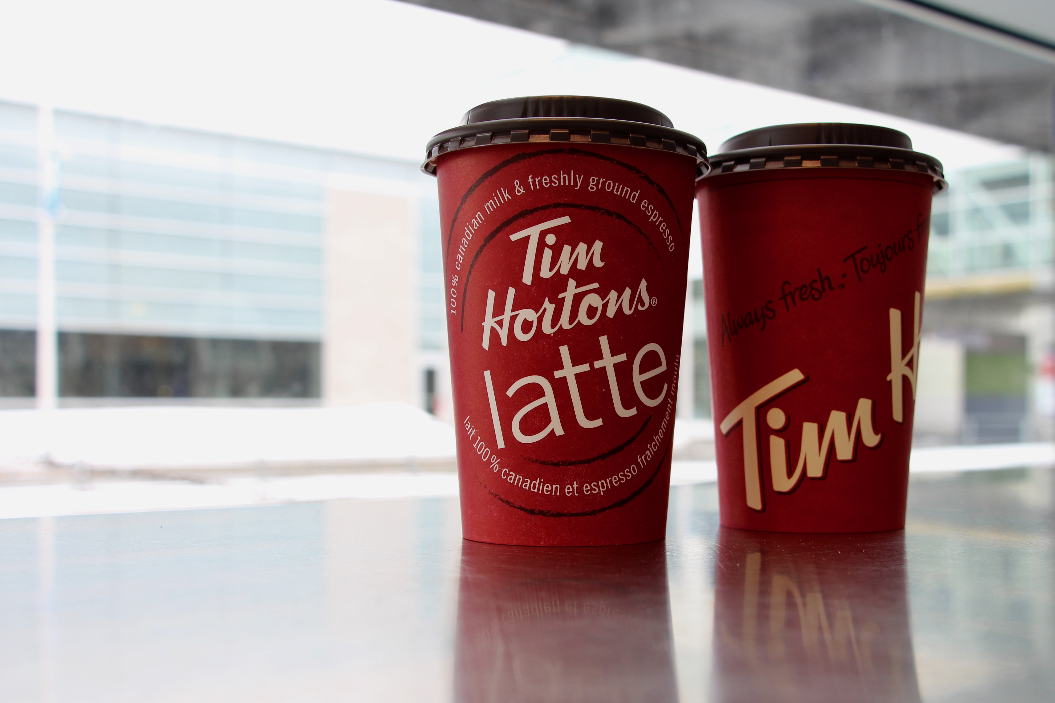 Two Tim Horton's coffee cups.