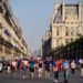 A crowd walking on Rue de Rivoli celebrating France's World Cup Win.