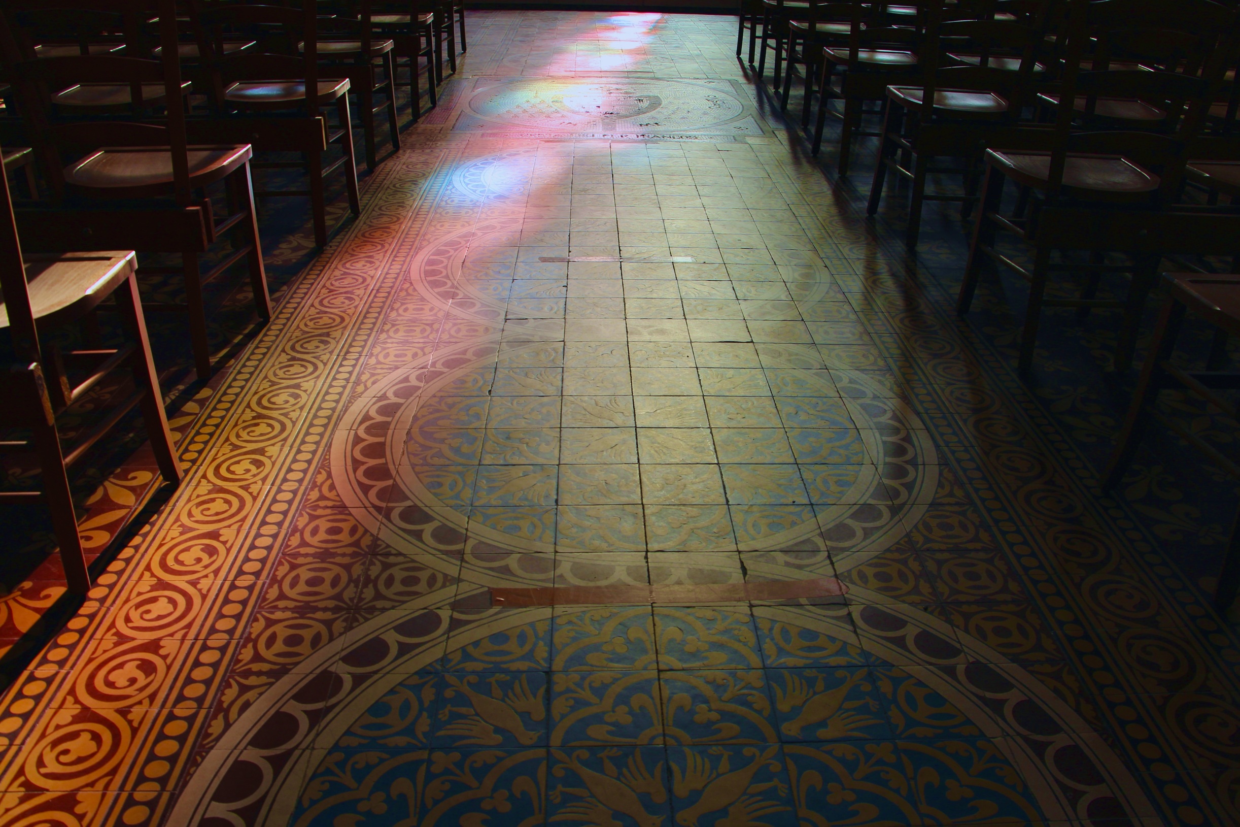 Light shines through the stained glass of the Basilique Sainte-Clotilde.