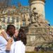 Jalen and Maria kiss in the Place Aristide-Briand in Reims, France.