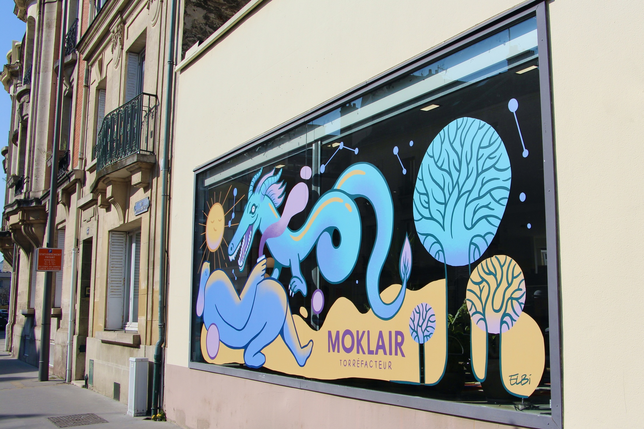 Moklair's window art decorates Rue Andrieux in Reims, France.