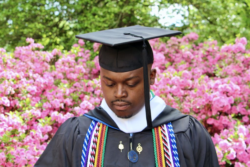 Jalen wearing his undergraduate graduation regalia at the University of Mary Washington.