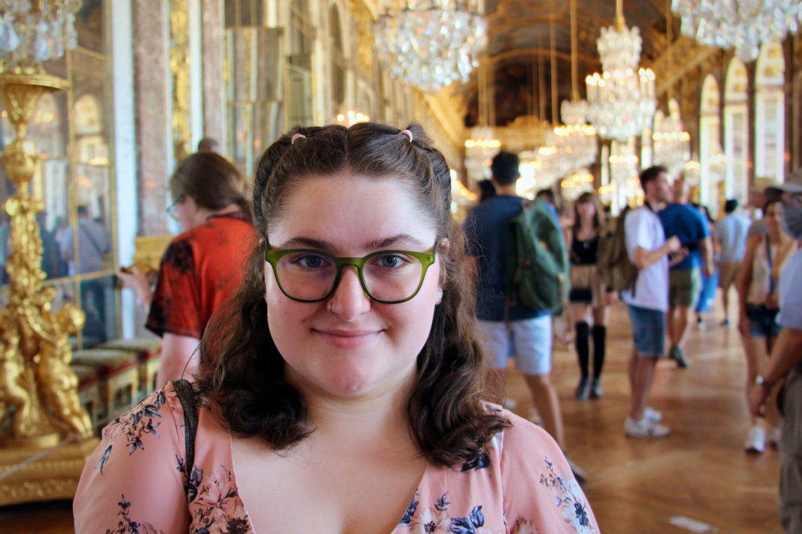 Maria in the Hall of Mirrors at the Palace of Versailles.
