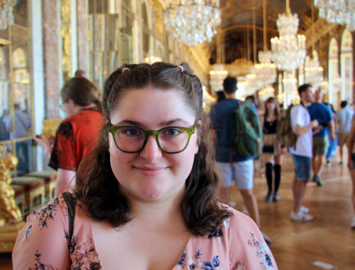 Maria in the Hall of Mirrors at the Palace of Versailles.