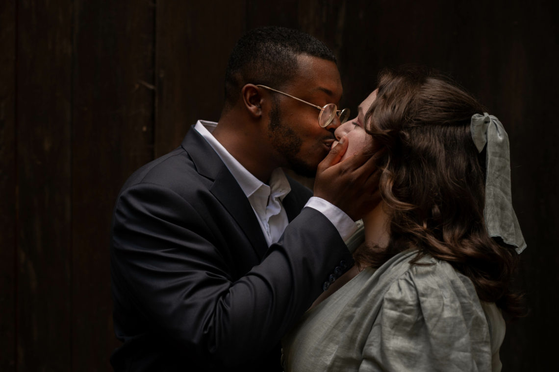 Maria and Jalen kiss after their wedding.