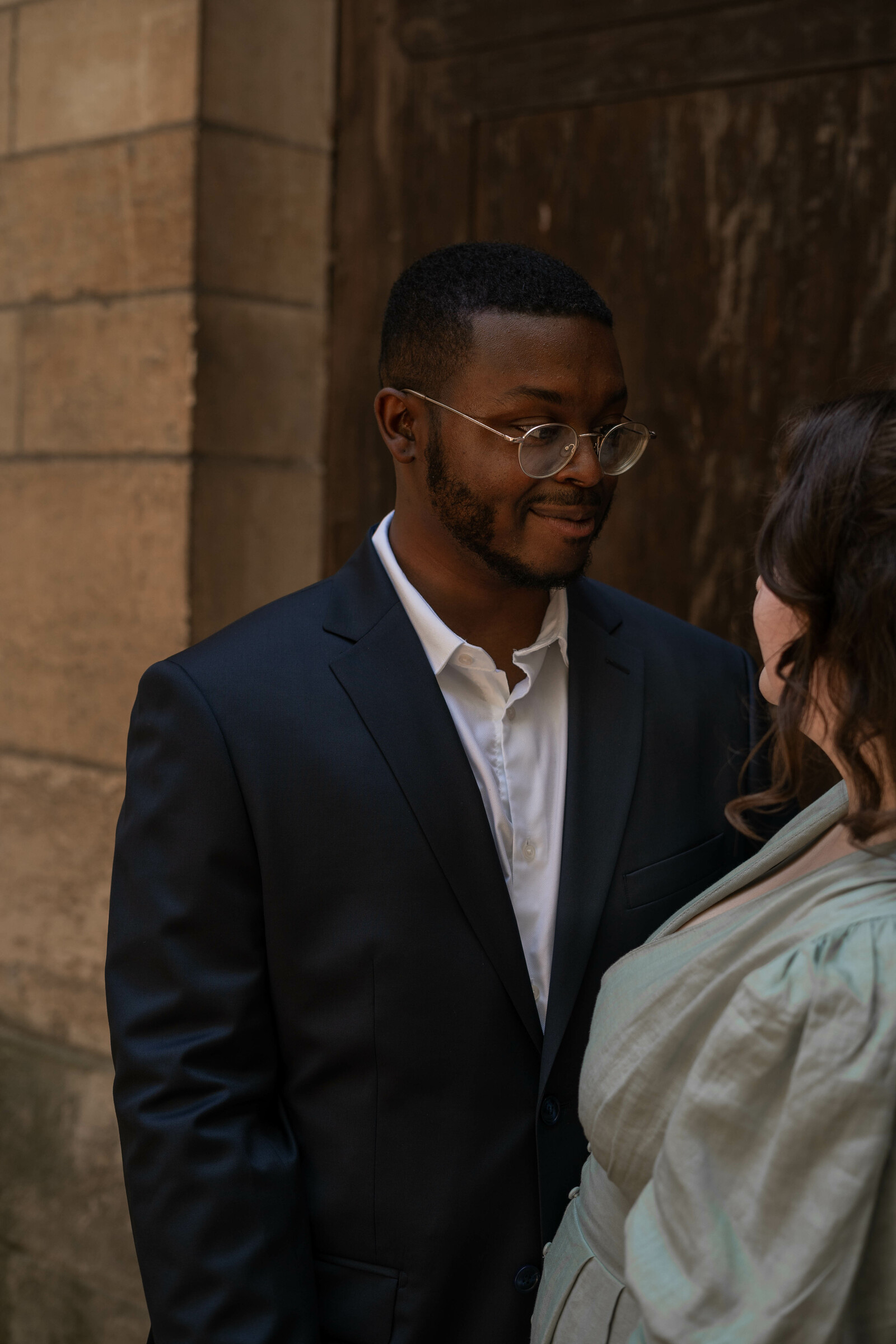 Jalen looks at Maria after their wedding.