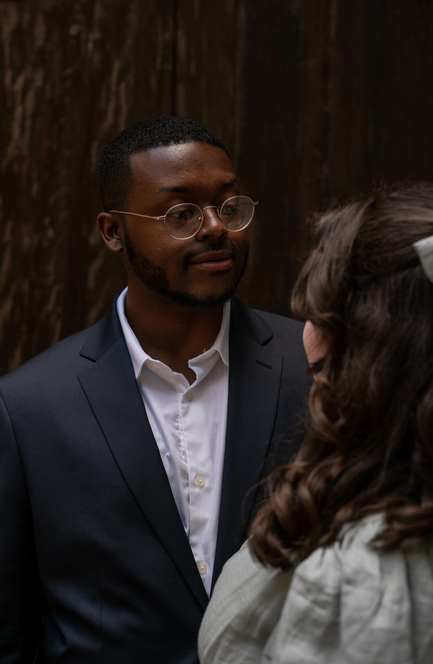 Jalen looks at Maria after their wedding.
