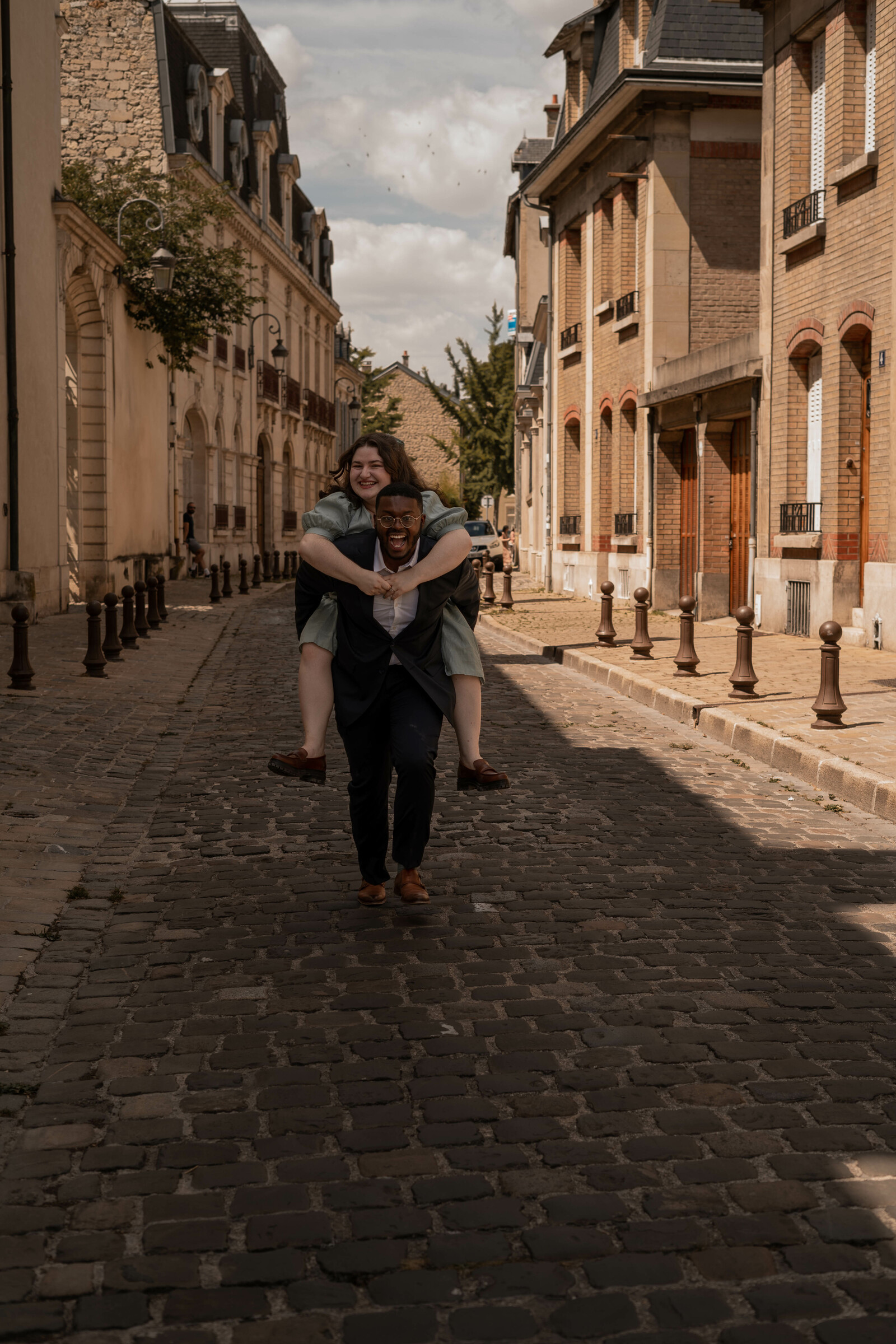 Jalen gives Maria a piggyback ride after their wedding.