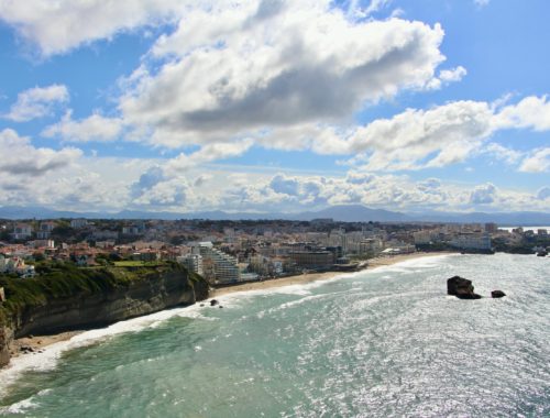 A view of Biarritz's coastline on a sunny day.