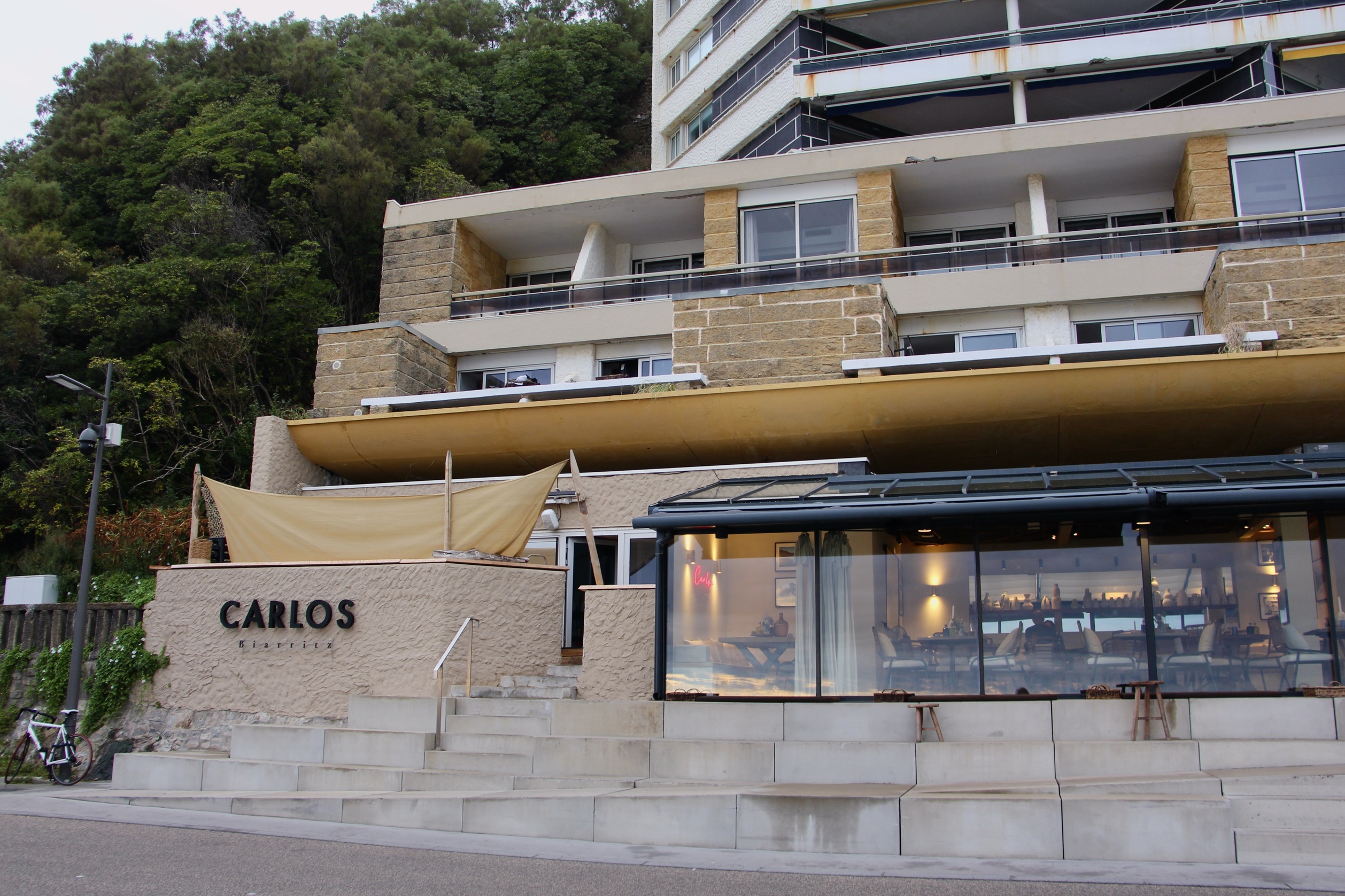 The exterior of Carlos, a bar and restaurant in Biarritz, France.