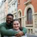 Jalen hugs Maria on Rue des Jacobins in Reims, France.