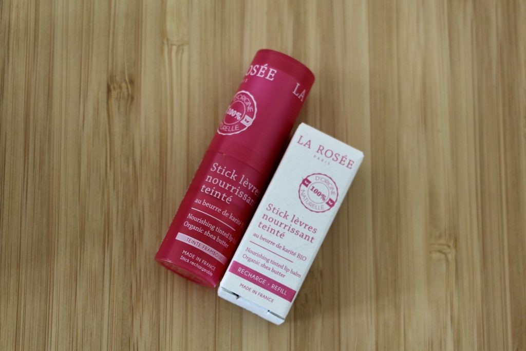 A tube of La Rosée lip balm and a refill pack.