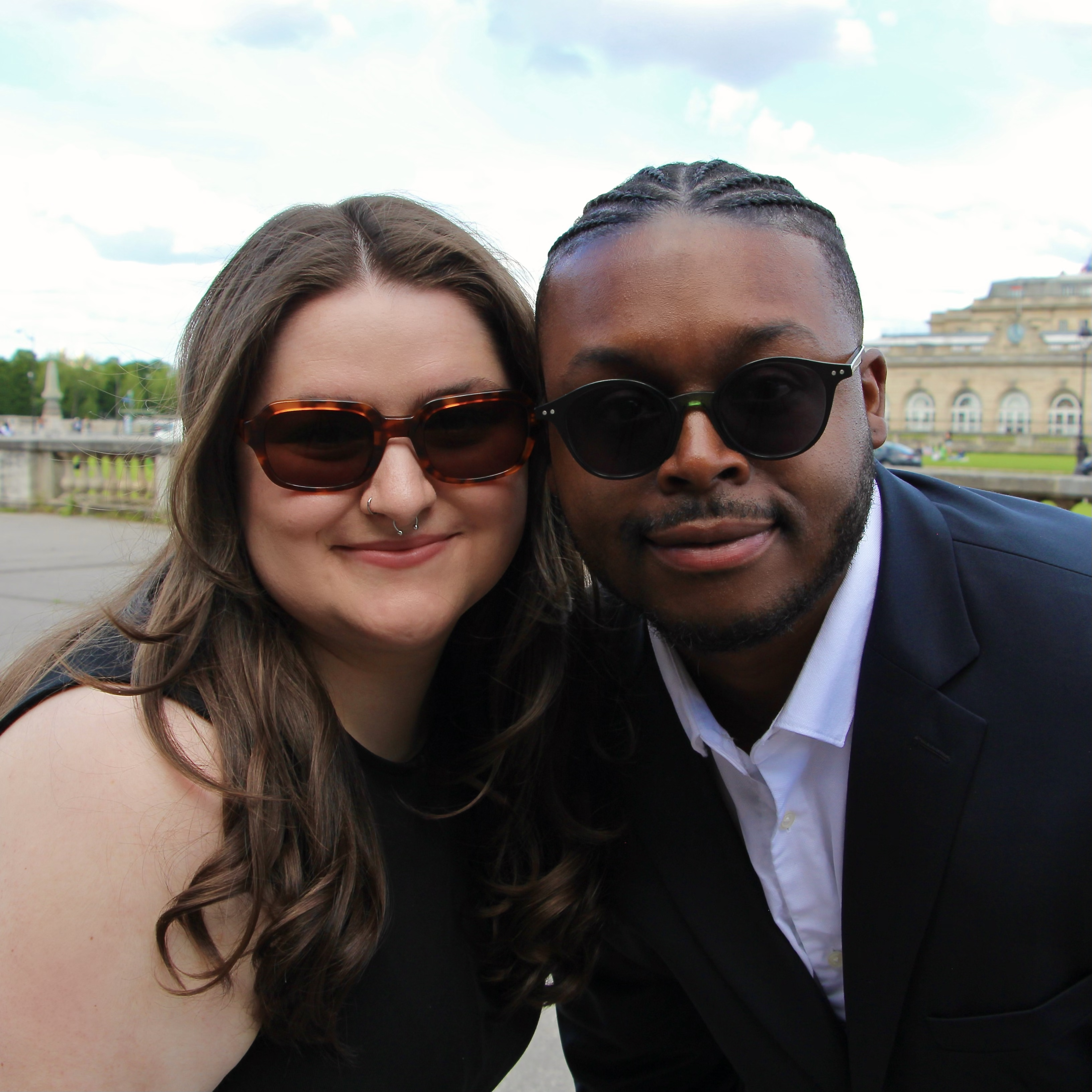 Maria and Jalen pose together in sunglasses in Paris, France.